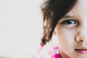 Little girl child with concerned expression