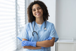 Smiling nurse in scrubs